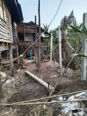 Canvas Print - a vertical photo of an abandoned house in Thailand