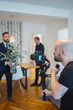 © Daniel Gonzalez/Stocksy - Videographer recording real estate agents