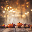 © Arturo - pumpkins on wood floor with out of focus lights in the distance for photo backdrop background
