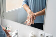 © Alba Vitta/Stocksy - Hand washing with soap in bathroom