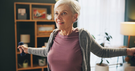 Wall Mural - Senior, happy woman and weightlifting with dumbbells in exercise, workout or strength at home. Elderly female person with smile or light weights for lifting, stretching or warm up in fitness at house