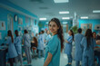 © PRASANNAPIX - young indian female doctor standing at hospital