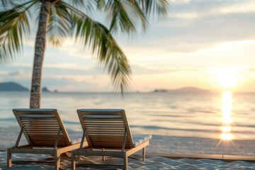 Poster - Two lounge chairs by the sea, with a palm tree nearby