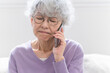 © aijiro - スマートフォンで通話をしているシニア女性