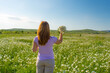 © andreymuravin - Girl in a chamomile field