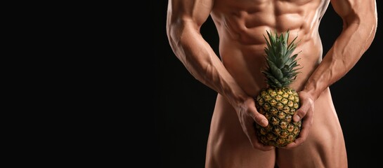 Poster - Sexy naked bodybuilder holding pineapple on dark background with space for text, closeup