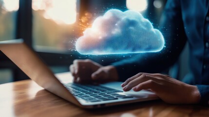 Fototapete - A person is typing on a laptop with a cloud on the screen
