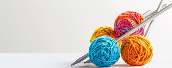 Isolated knitting needles with colorful yarn on white background, 4K hyperrealistic photo