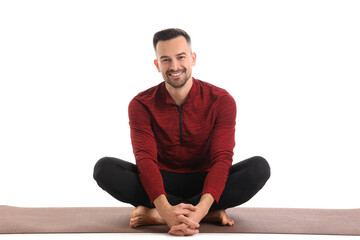 Sticker - Handsome man sitting on yoga mat against white background