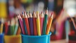 © nuttapong - A vibrant collection of colored pencils arranged in a blue cup, perfect for art projects and creative endeavors.