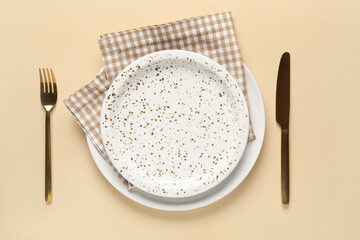 Beautiful table setting on yellow background