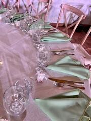 setting tables for receiving guests in a restaurant
