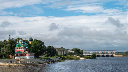 View of Uglich Kremlin from the Volga river. Golden Ring of Russia. The Church of Dimitry on the Blood and the Transfiguration Cathedral. Power Plant.