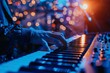 © nsit0108 - Musician is playing a keyboard on a stage with blurred lights in the background