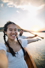 Wall Mural - Young couple having fun on the boat