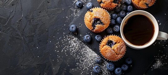 Wall Mural - A black and white photo of muffins and blueberries with a cup of coffee