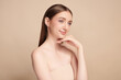 © kitthanes  - Beautiful young woman with clean fresh skin on beige background, Face care, Facial treatment, Cosmetology, beauty and spa, women portrait.