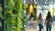 © SKIMP Art - A green living wall in an office space, with people walking past it and creating natural light for energy efficiency and sustainability Generative AI