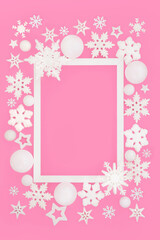 Wall Mural - Christmas festive snowflake star decorations magical background border on pink, white frame. Festive design for Noel, Yule Xmas holiday season. Gift tag, label, greeting card.