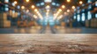 © Maria Mikhaylichenko - Rustic wooden table in foreground, blurred industrial warehouse or brewery taproom background with warm glowing lights creating inviting ambiance.