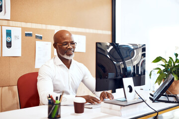 Aufkleber - Black man, mature and computer as management, ceo and entrepreneur in construction company or small business. Male person, tech and typing for email, supplier or employees for project or development