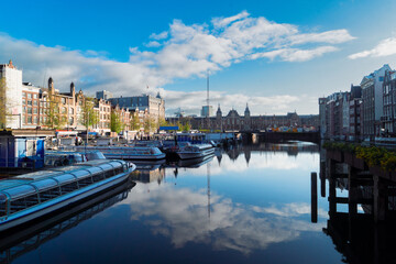 Poster - Moored boats and facades of old historic Houses over canal water, Amsterdam, Netherlands