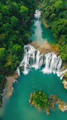 Poster - Aerial View of Lush Rainforest Waterfall.