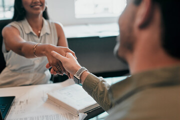 Wall Mural - Blueprint, deal and business people in architecture with handshake, project management or welcome. Agreement, man and woman shaking hands at desk in partnership, creative development and introduction