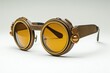 © EdvvinStudios - Round steampunk sunglasses resting on white background