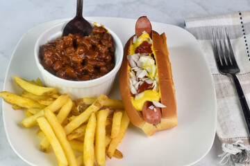 Wall Mural - hot dog  top with ketch up , onions and mustard