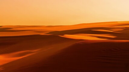 Wall Mural - A desert landscape with a bright orange sky. The sky is filled with clouds and the sun is setting. The sand dunes are covered in a golden hue, creating a warm and inviting atmosphere