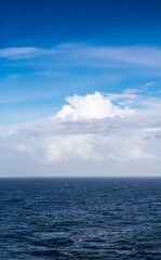 Cloudy Blue Colorful Sky over North Atlantic Ocean. Cloudscape Nature Background