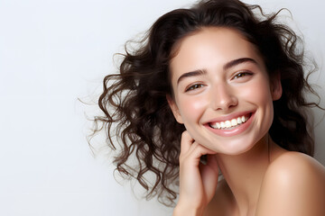 Wall Mural - portrait of a beautiful woman touch her face natural skin happy over clear background