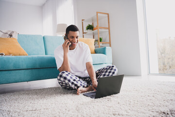 Sticker - Photo of handsome good mood guy nightwear pajama having rest talking modern gadgets indoors room home house