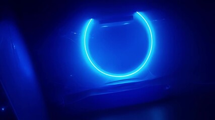 Poster - a glowing blue circle illuminates a dark space, creating a mysterious atmosphere and highlighting su