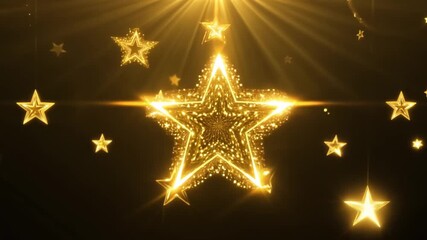 Wall Mural - a golden star is lit up in the dark. the star is surrounded by a bright light, creating a warm and i