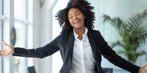 Wall Mural - african american female CEO dancing in office 