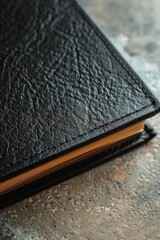 Poster - A close-up of a book lying on a table, with the cover and pages visible