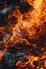 Aufkleber - A close-up view of a fire burning on a black surface