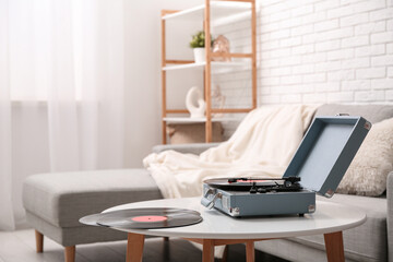 Poster - Interior of living room with sofa and record player on coffee table