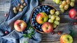 © Juan - Bowl of fresh fruits including apples, grapes, and blueberries
