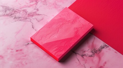 Poster - A close-up view of a pink box sitting on a marble surface