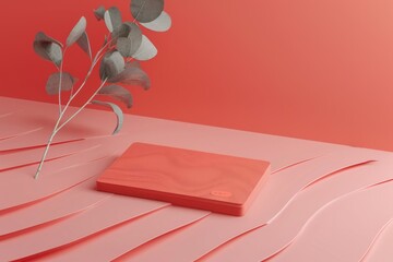 Poster - A red box sits atop a table next to a small plant, providing a pop of color