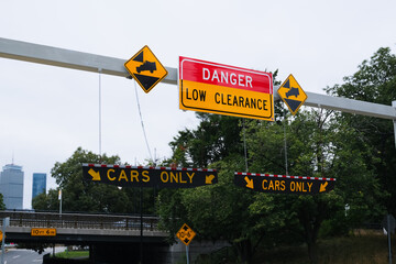 danger sign of low clearance on the road traffic