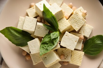 Wall Mural - Tofu in a bowl with beans and soy on a light background