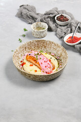 Wall Mural - Salmon Steak with Mashed Potatoes and Caviar Sauce on a Ceramic Plate