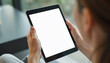 © 2April - A person holds a tablet with a blank white screen, providing a clean design for presenting information or showcasing a technology concept.