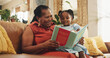 © AzeemudDeen/peopleimages.com - Grandmother, child and reading book for education with smile, learning literature and fantasy storytelling. Black family, woman and girl with creative knowledge, support and language growth at house