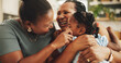© AzeemudDeen/peopleimages.com - Happy, relax and black child with mother and grandmother in home for womens day celebration together. Fun, bonding and African female generations hugging for connection in living room at family house