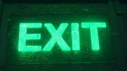 Wall Mural - Rugged Green Exit Sign with Textured Appeal